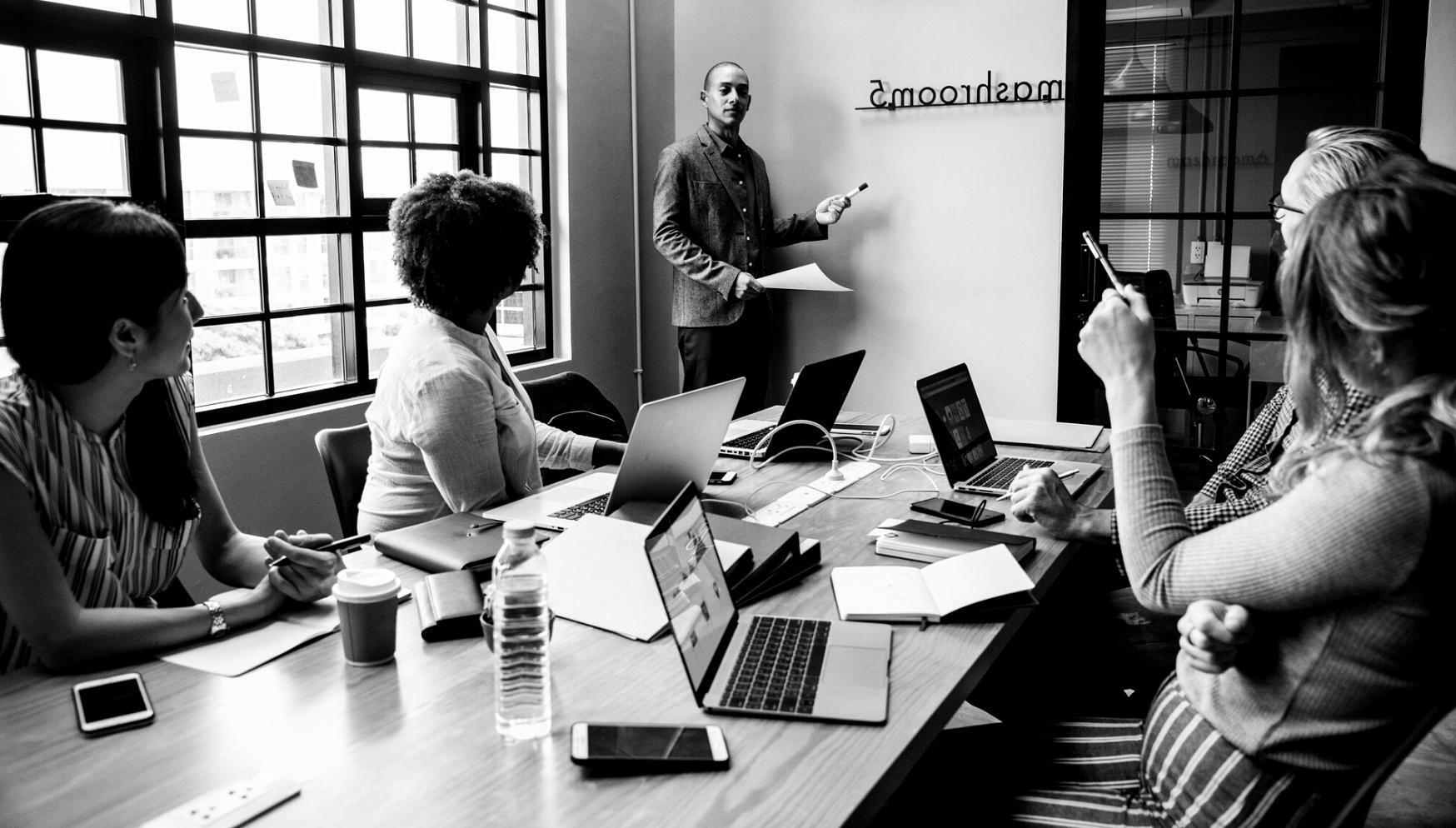 Team collaboration on financial forecasting with digital tools and analysis reports